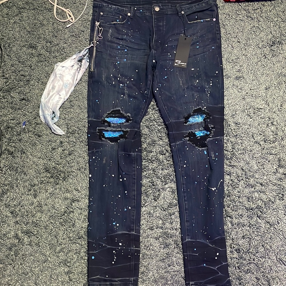 Dark blue with white and blue splatter jeans